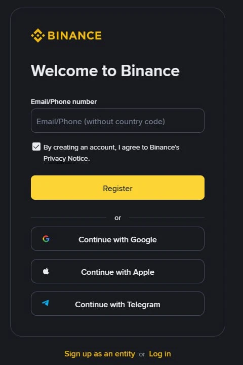 Ekrani i parë i regjistrimit te Binance: një fushë e vetme për email ose numër telefoni, kutia e pranimit të njoftimit të privatësisë, butoni Register dhe tri mundësitë Google, Apple e Telegram